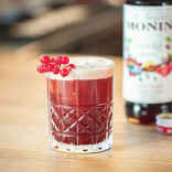 Monin RAUDONŲJŲ UOGŲ SU PRIESKONIAIS sirupas, 0,7 l